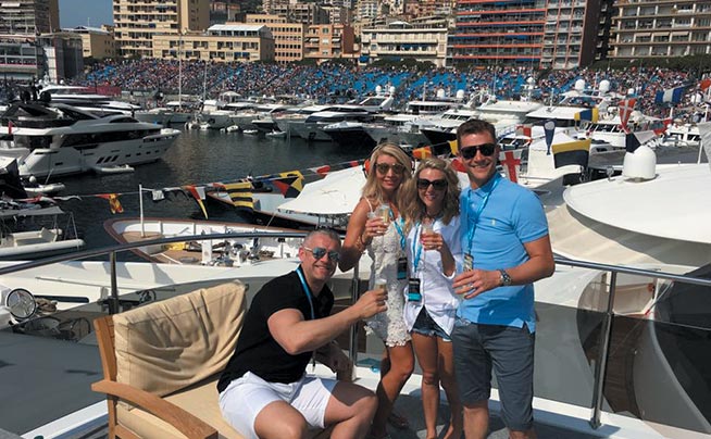 friends enjoying the GP on a yacht